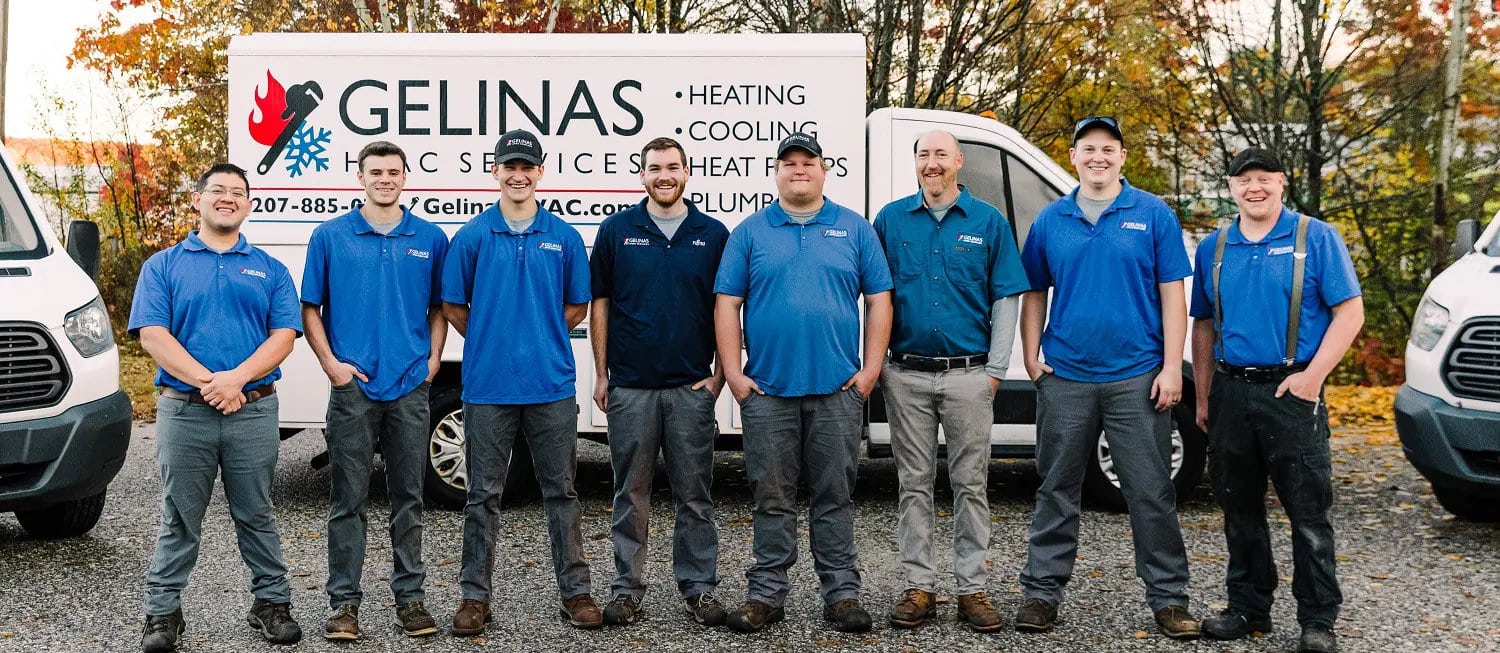 Gelinas HVAC Services' installation team in front of service vehicles at Scarborough office.
