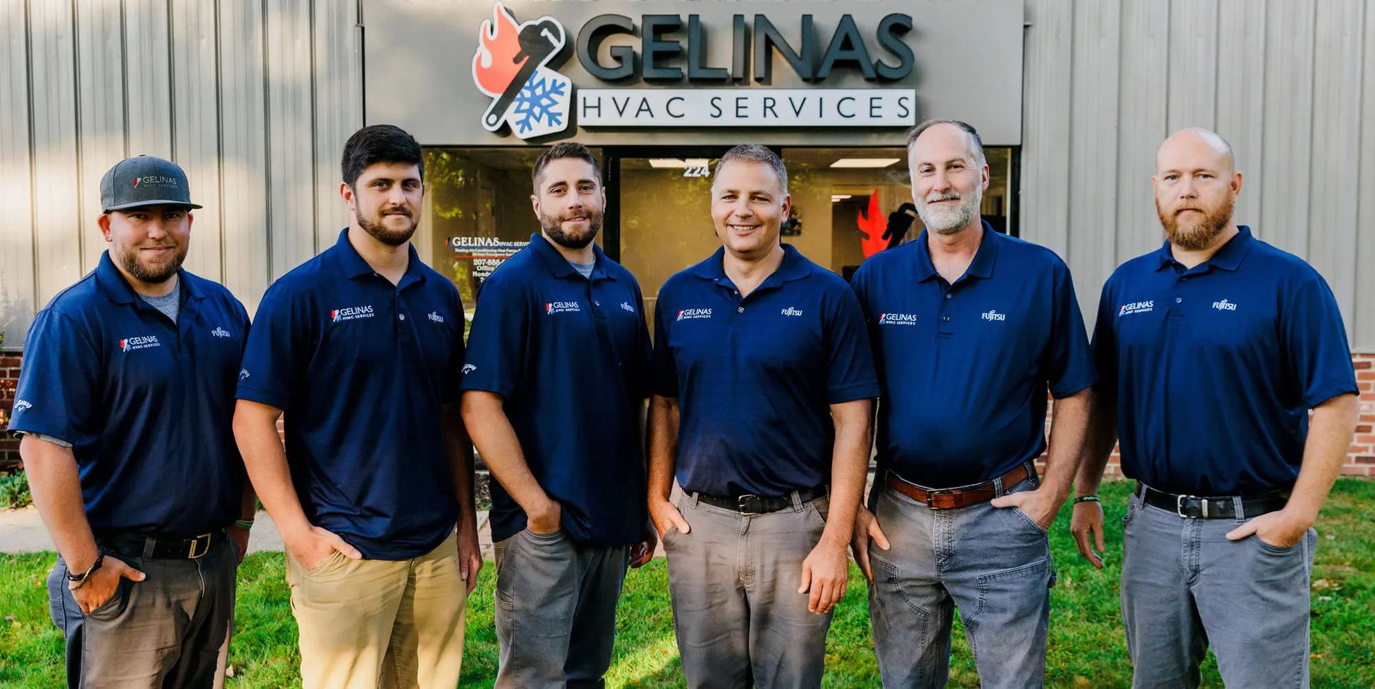 Gelinas leadership team in front of Scarborough office.